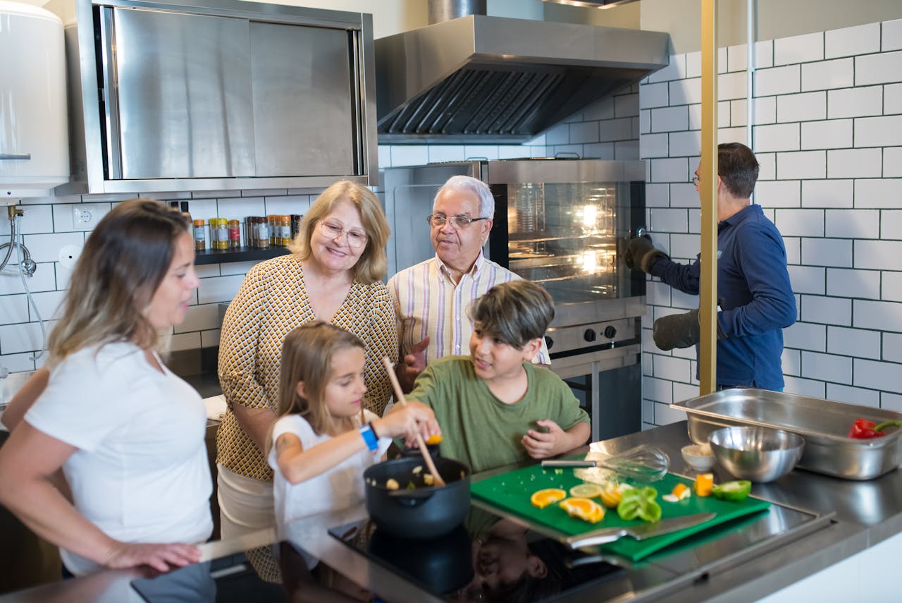 A Family Preparing Food in the Kitchen